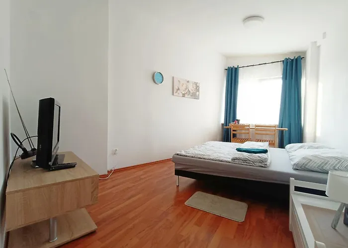 Pokoj s manželskou postelí velikosti queen